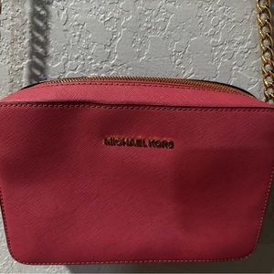 Michael Kira pink cross body bag.